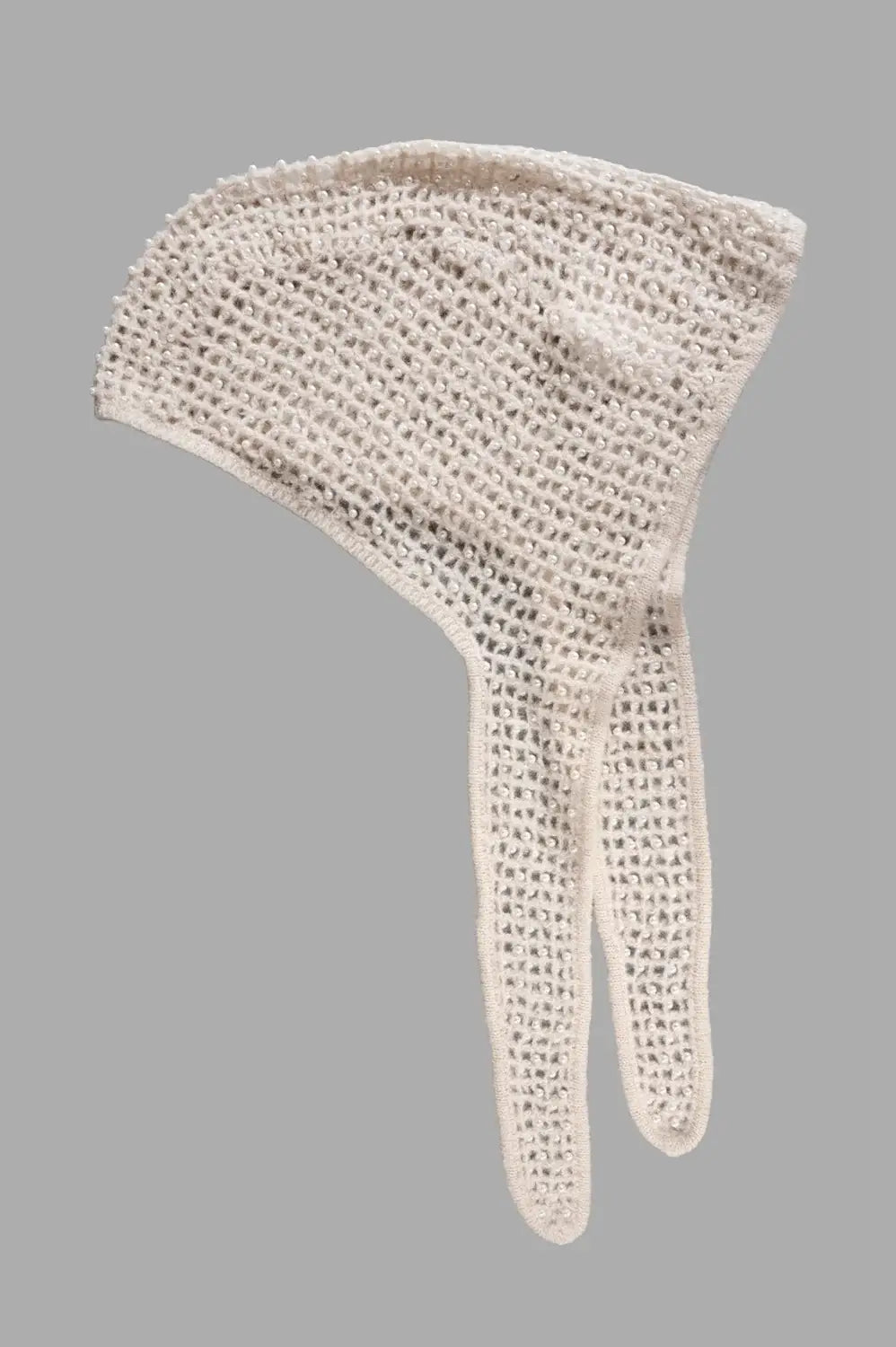Full-length view of pearl-embellished knit hood in oyster gray with split scarf ties and airy open stitch