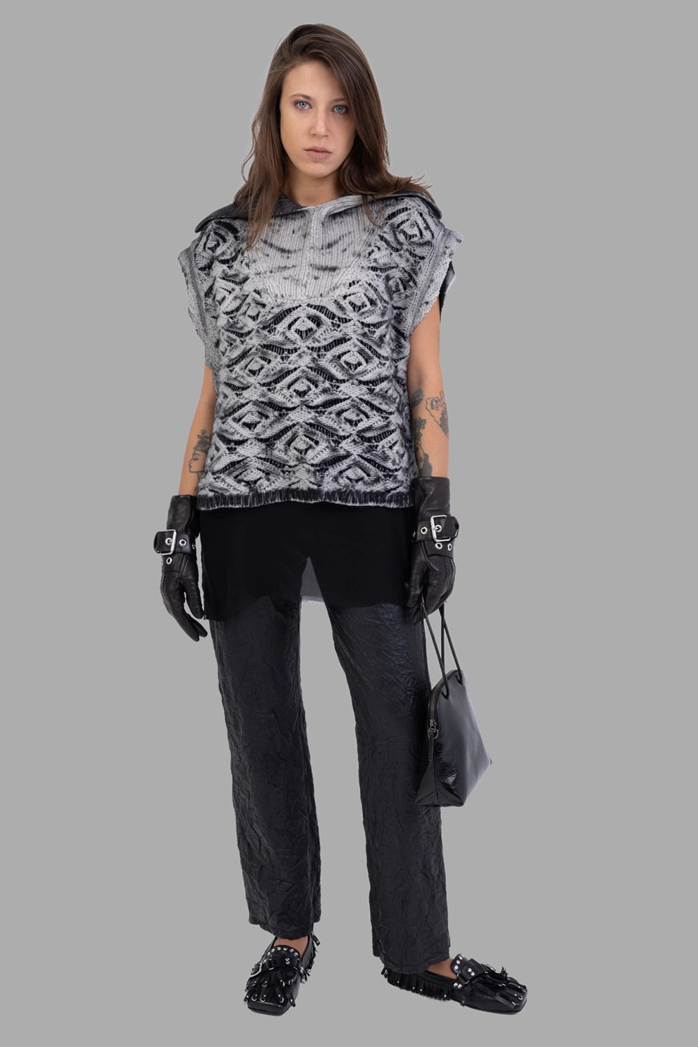 Giovanni Cavagna women knit poncho in black, on-model full length, degradé openwork and oversized rib collar.