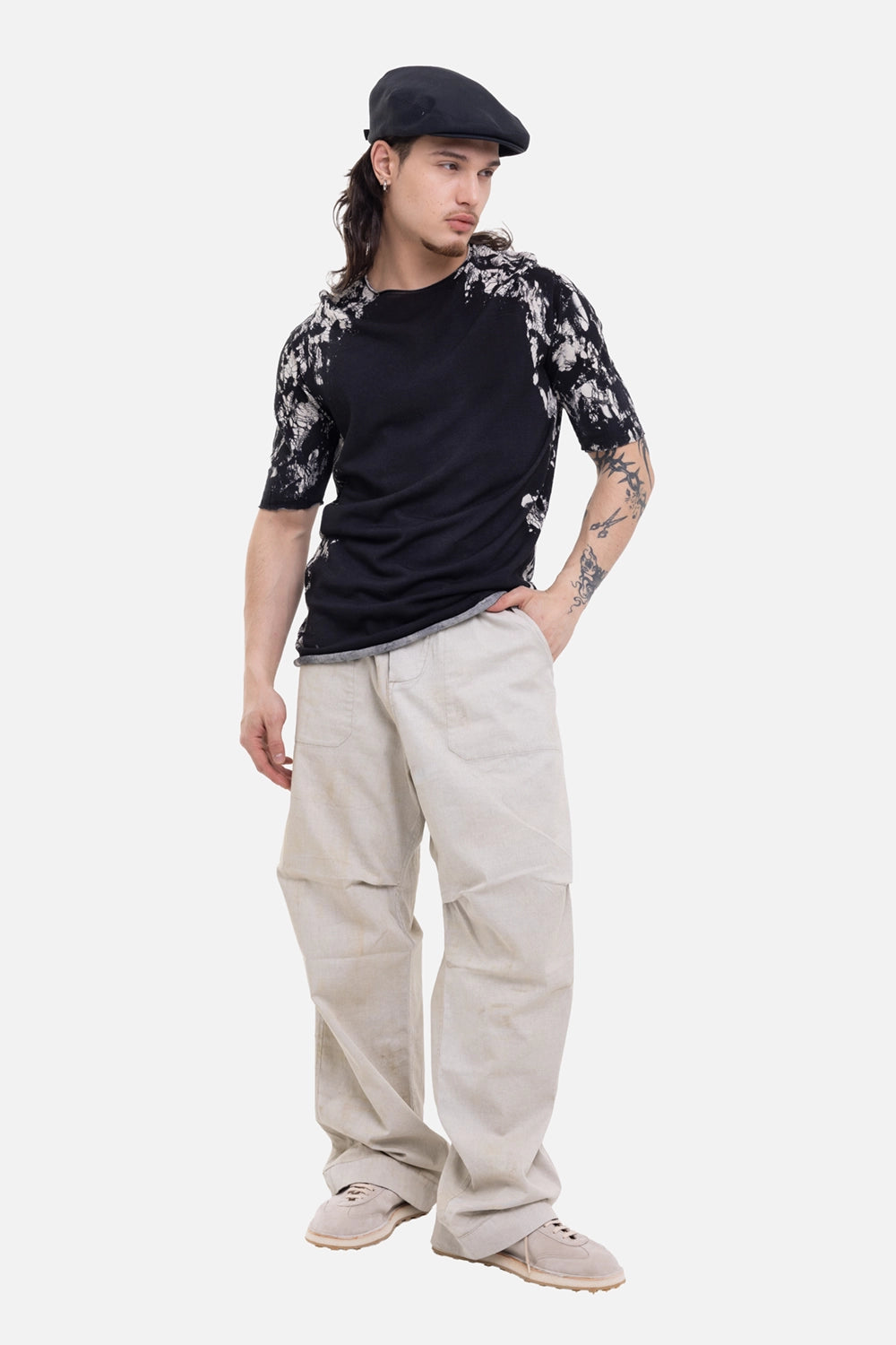 MD75 men's knit T-shirt in black/white, on-model full-length view, contrast dyed sleeves