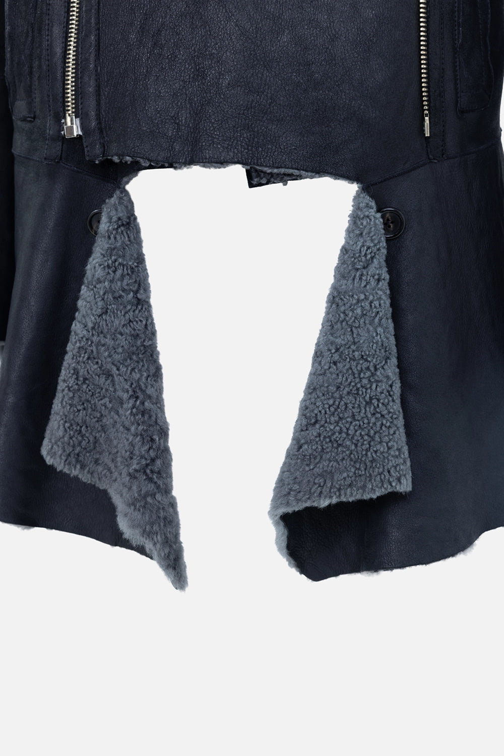 Pre-owned Ann Demeulemeester men's leather jacket in black, hem detail view, grey shearling underlayer panel