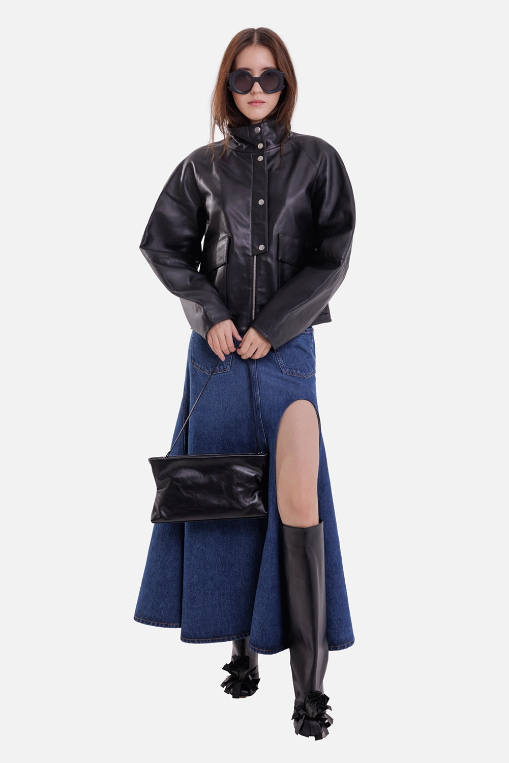 By Malene Birger women's black leather jacket, on-model full-length view with high collar and silver snap placket