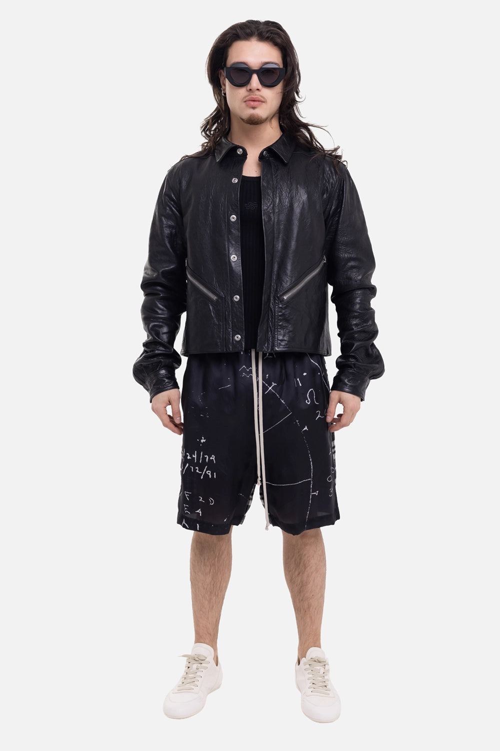 Rick Owens men's leather shirt jacket in black, on-model full-length view, snap front worn open