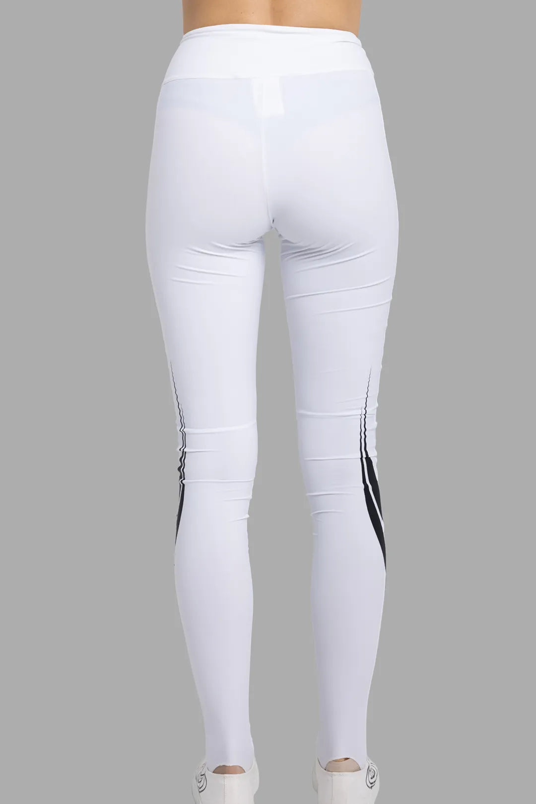 MSGM women's white Lycra leggings, back view showing contour seams and race graphic at calves