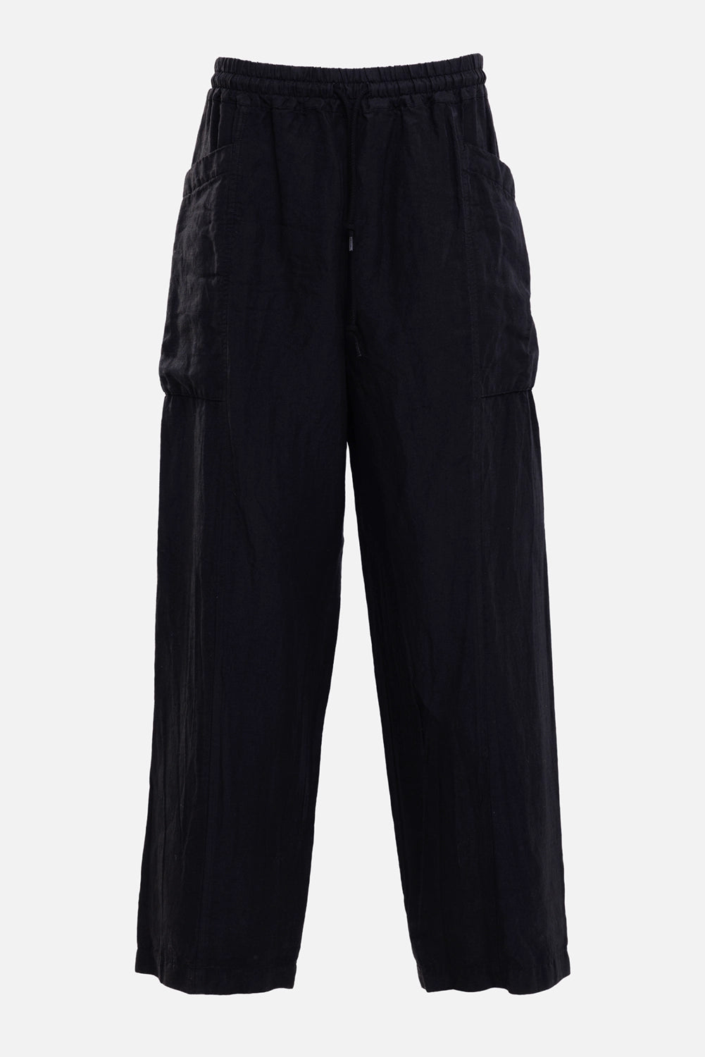 Comme des Garçons Homme men's cargo trousers in black, front view, drawstring waist and wide legs