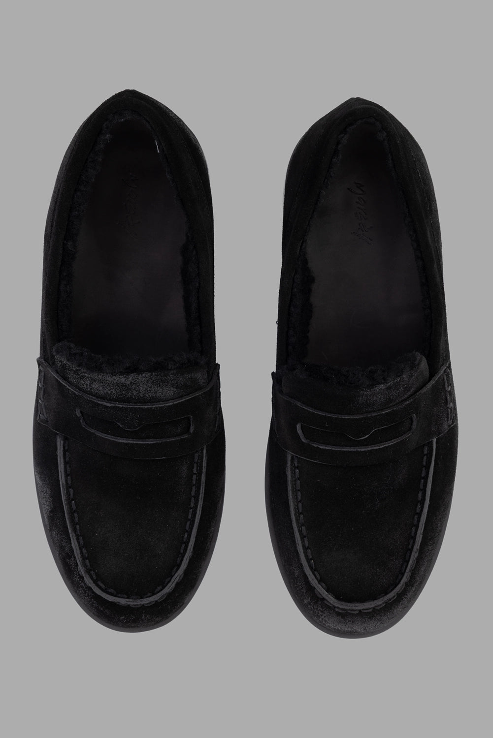 Marsèll loafers in black, overhead pair, shearling lining and apron stitching