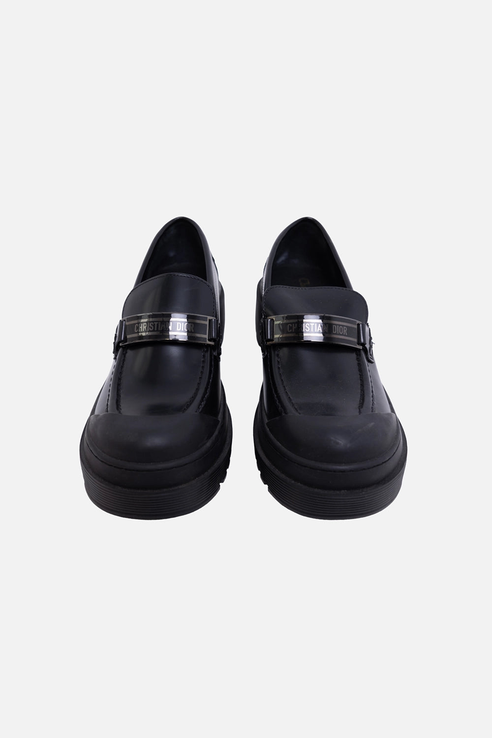 Pre-owned Christian Dior women's loafers in black, front view, rounded toe and engraved plaque strap