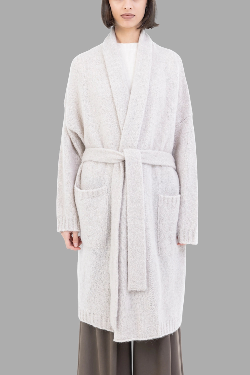 GentryPortofino women's long cardigan in Stucco, front view, shawl collar, tie belt and patch pockets.
