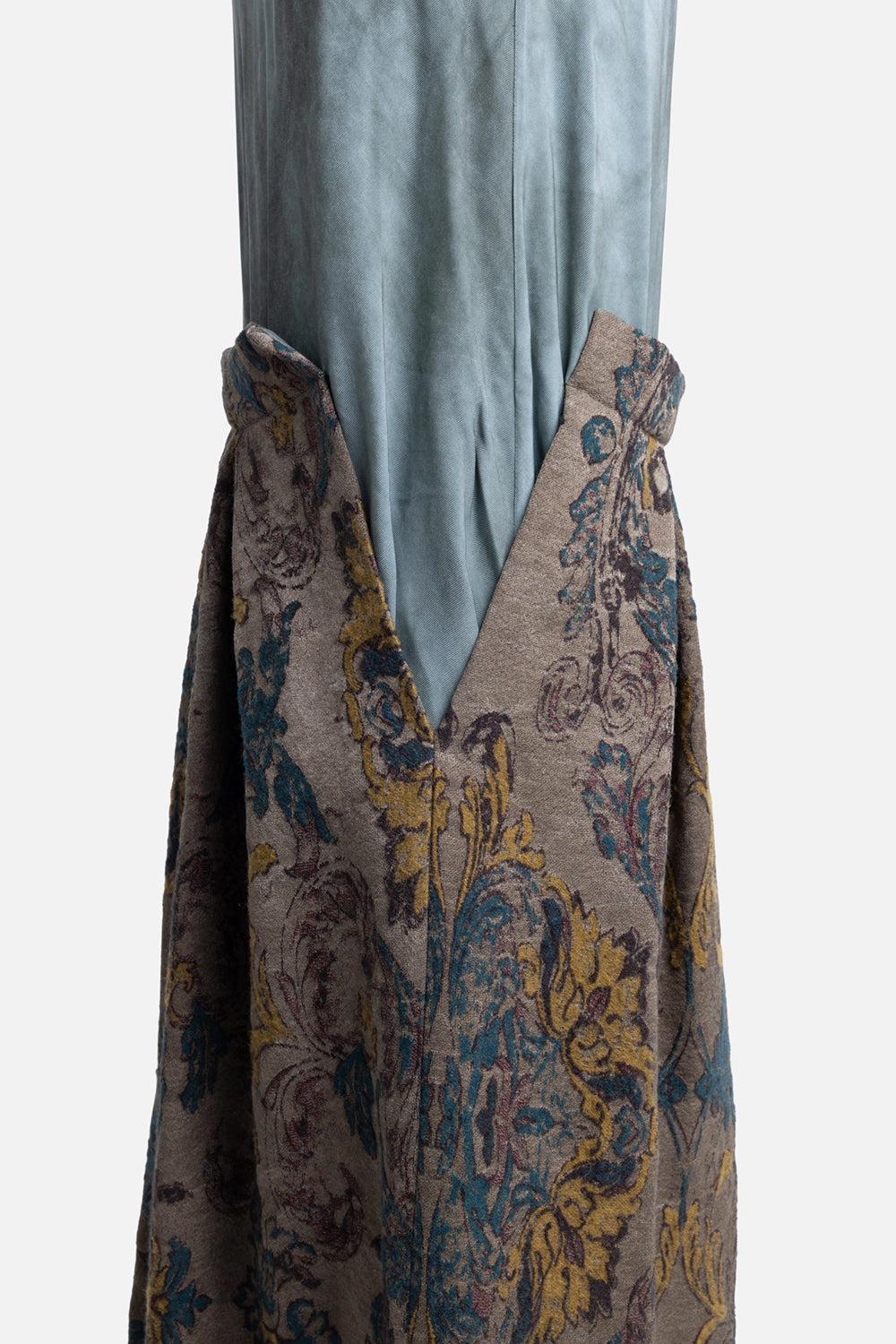 Pre-owned Uma Wang long dress in tan/blue/brown, fabric close-up, V-shaped opening over floral tapestry jacquard panel