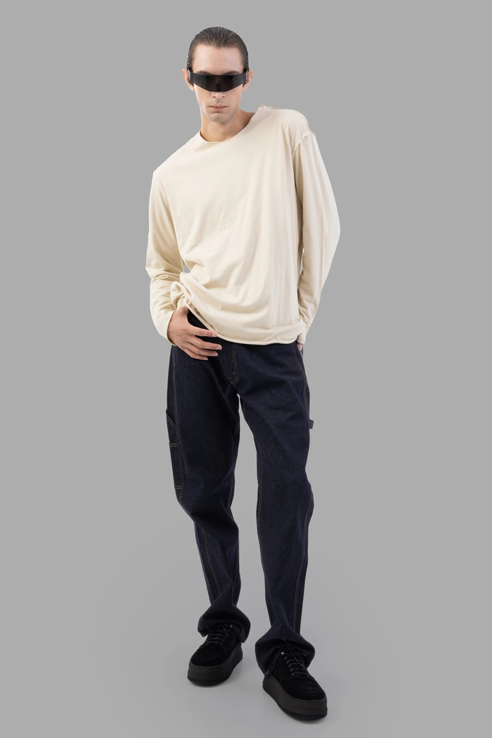 Attachment long-sleeve T-shirt in ecru, on-model full length, relaxed drape and curved hem
