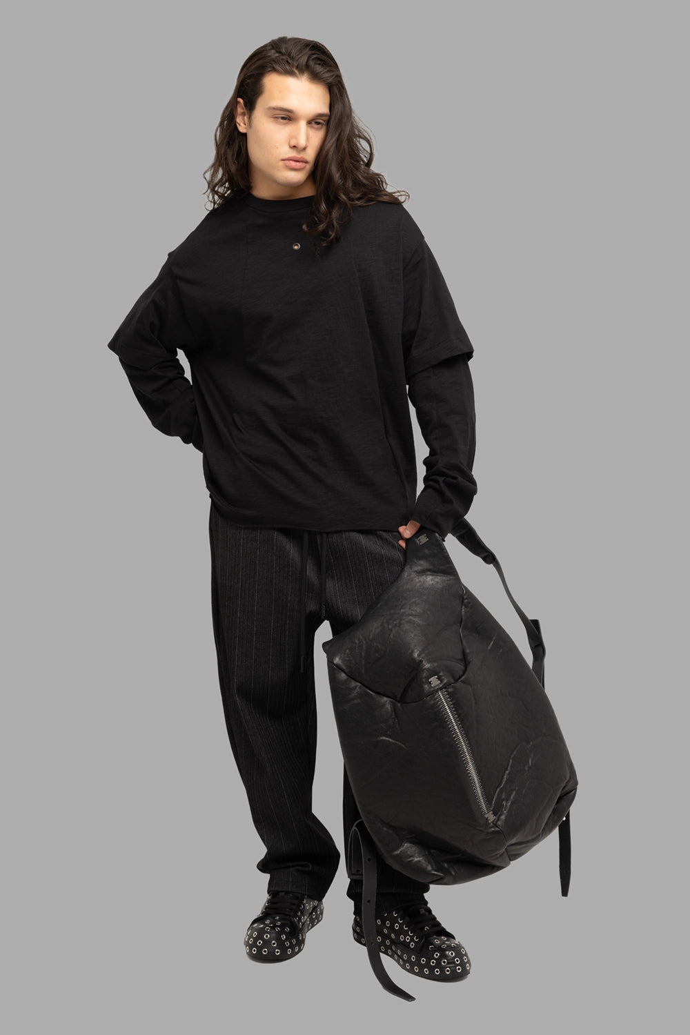 Justin Gall men’s long-sleeve tee in black, on-model full length, layered-sleeve look with relaxed fit