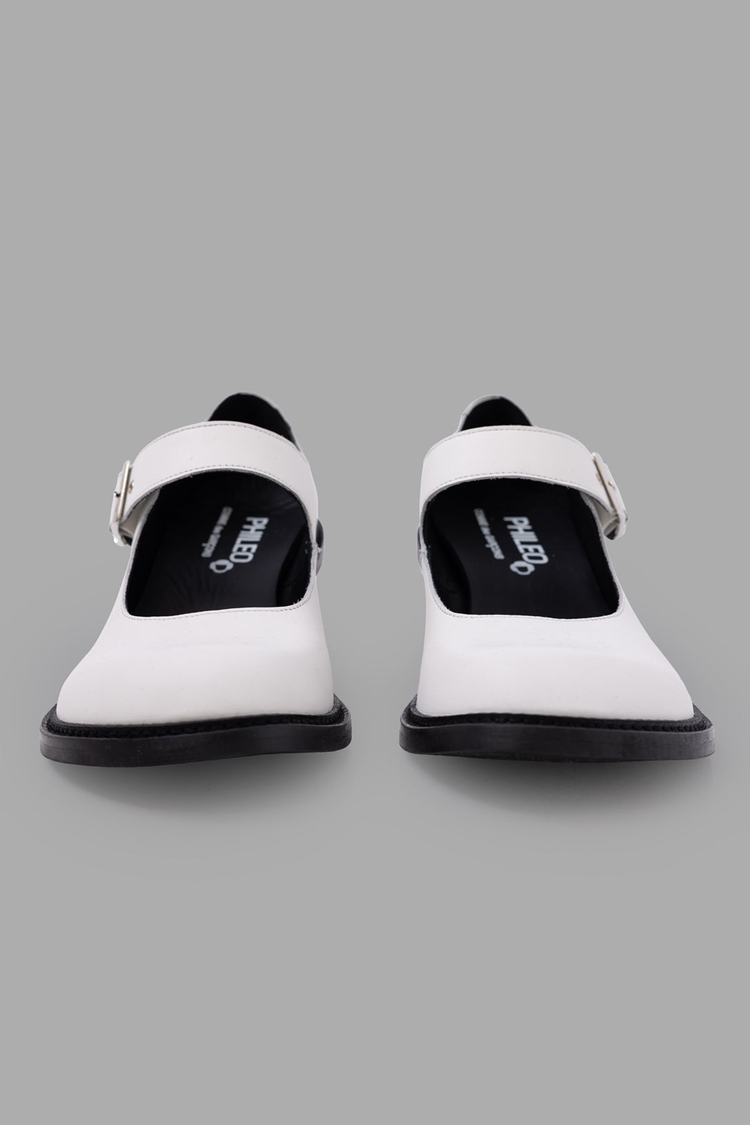 PHILEO x Comme des Garçons women's Mary Jane pumps in white, front view, round toes and wide strap.