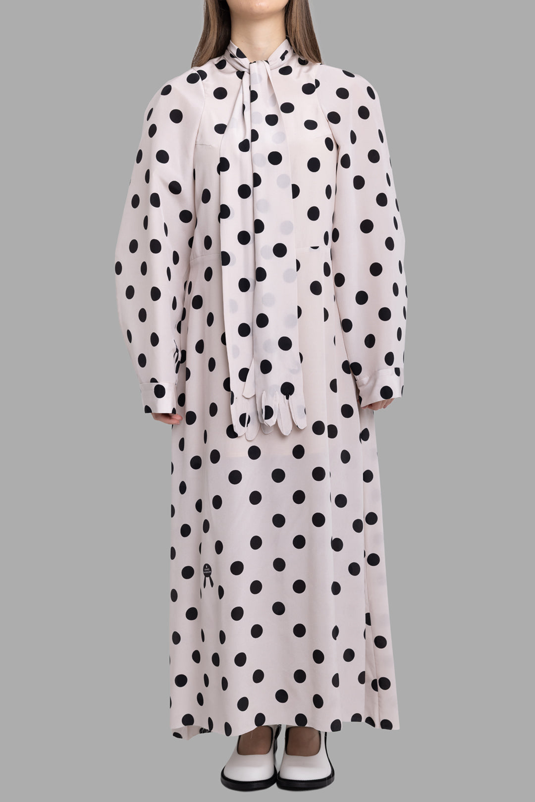 Natasha Zinko women's maxi dress in beige, front view, bold black polka dots and long scarf neckline