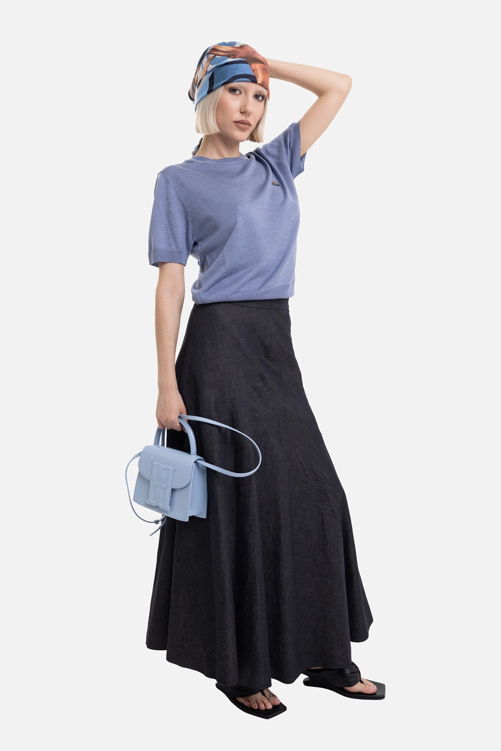 Vivienne Westwood women's maxi skirt in navy, on-model full-length view, high waist and sweeping hem