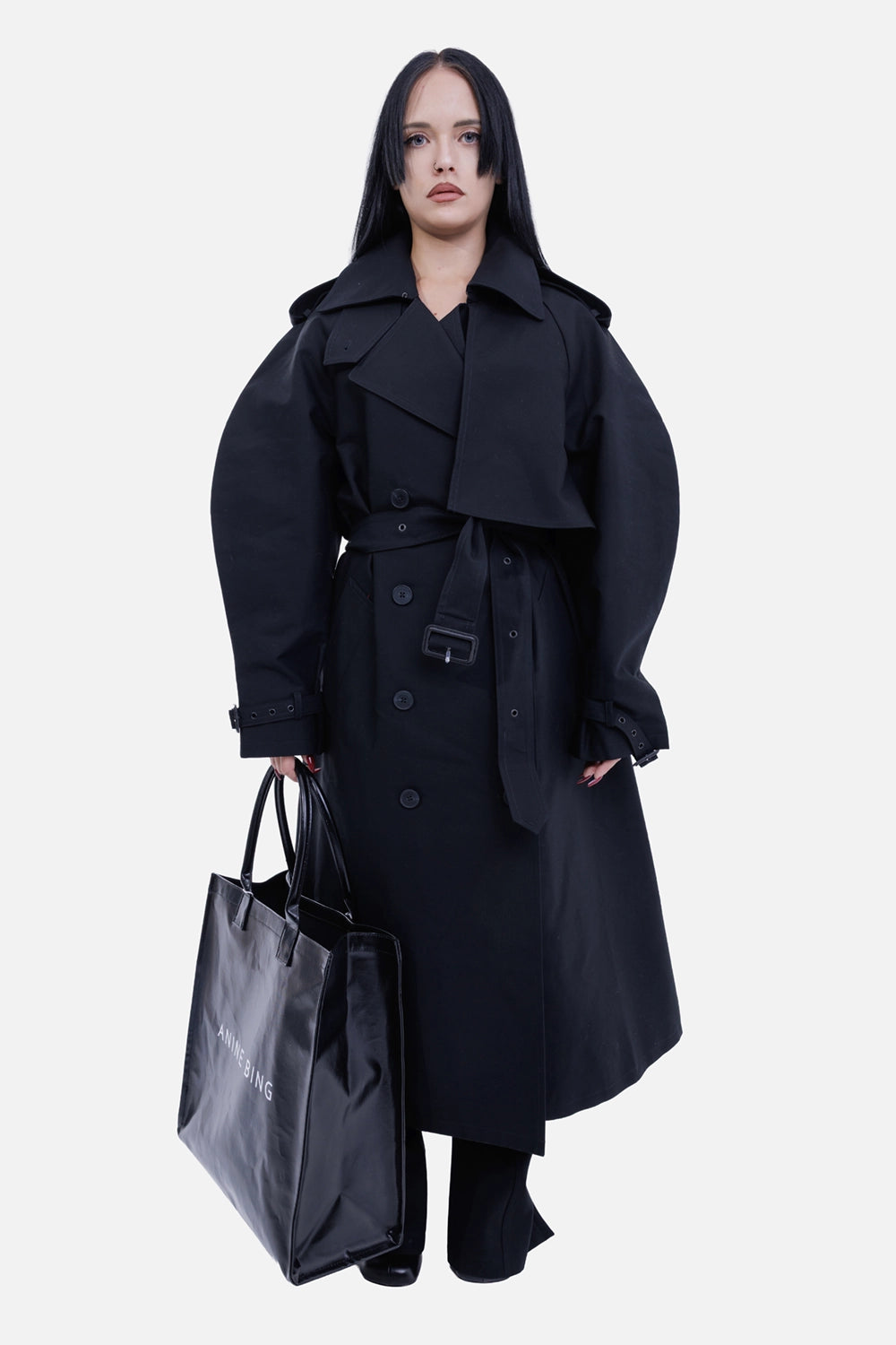 Anine Bing women's black maxi trench coat, full-length on-model view with belted waist and wide lapels