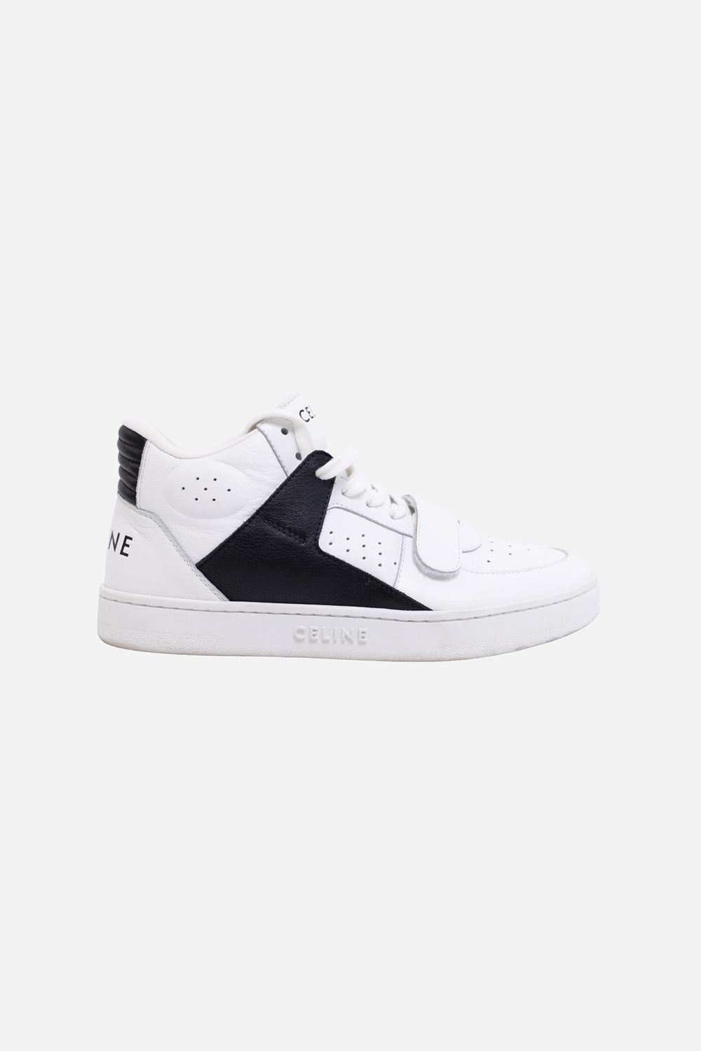 Pre-owned Celine unisex CT-02 mid-top sneakers in white and black, side view, black leather panel and strap closure.