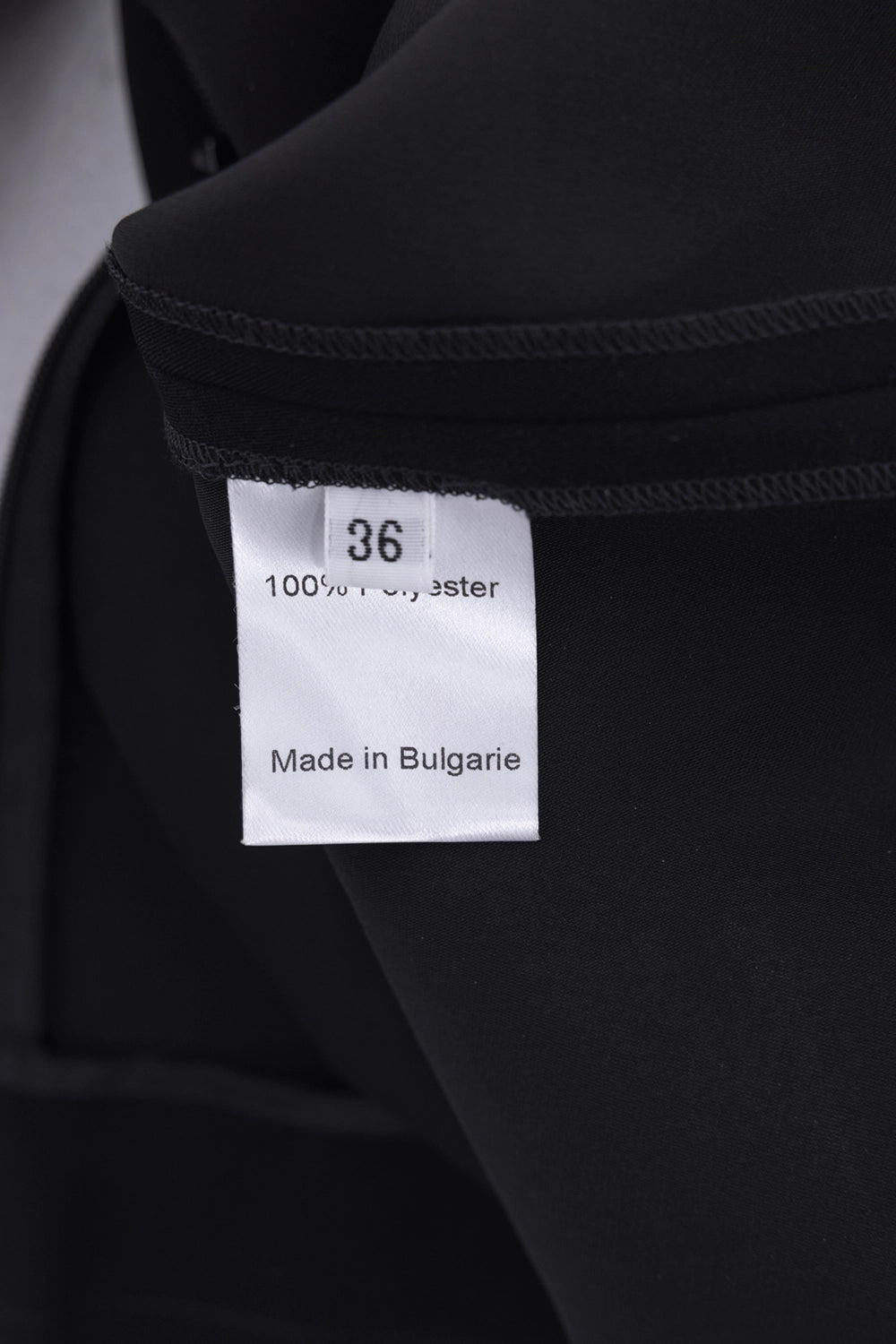 Pre-owned Alexandre Vauthier women's mini dress in black, care-tag view, size and fabrication label