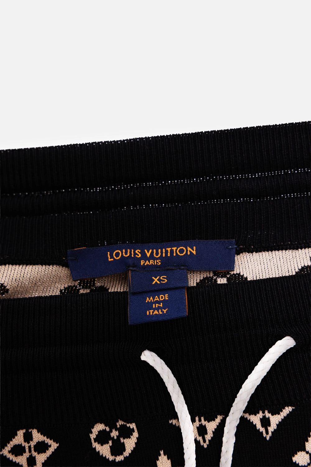 Louis Vuitton women's jogging pants in black and camel, label detail with ribbed waist and white drawstrings