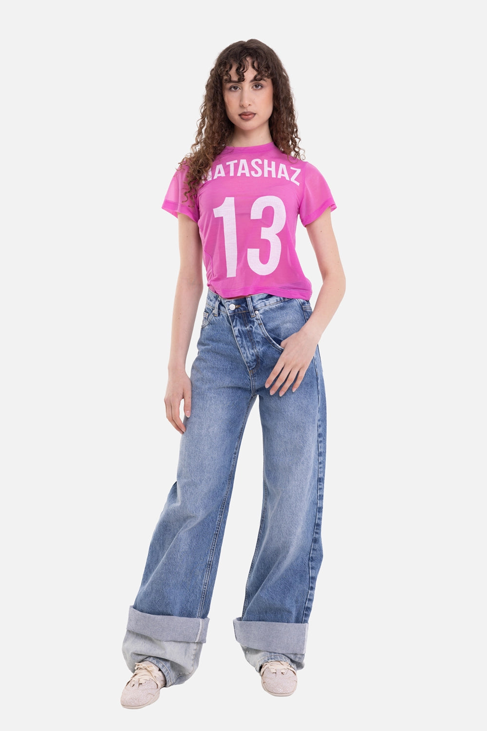 Natasha Zinko unisex jeans in light wash, on-model full-length view, wide legs with oversized cuffs