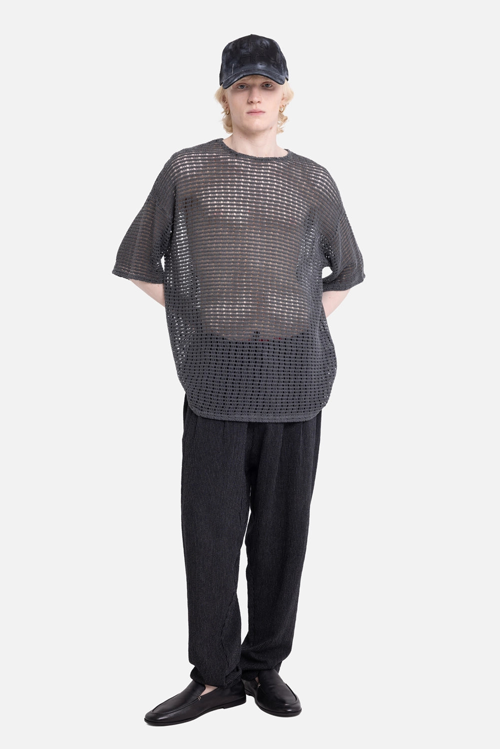 LA HAINE INSIDE US men's open-knit mesh T-shirt in gray, on-model full-length, sheer grid knit and wide sleeves
