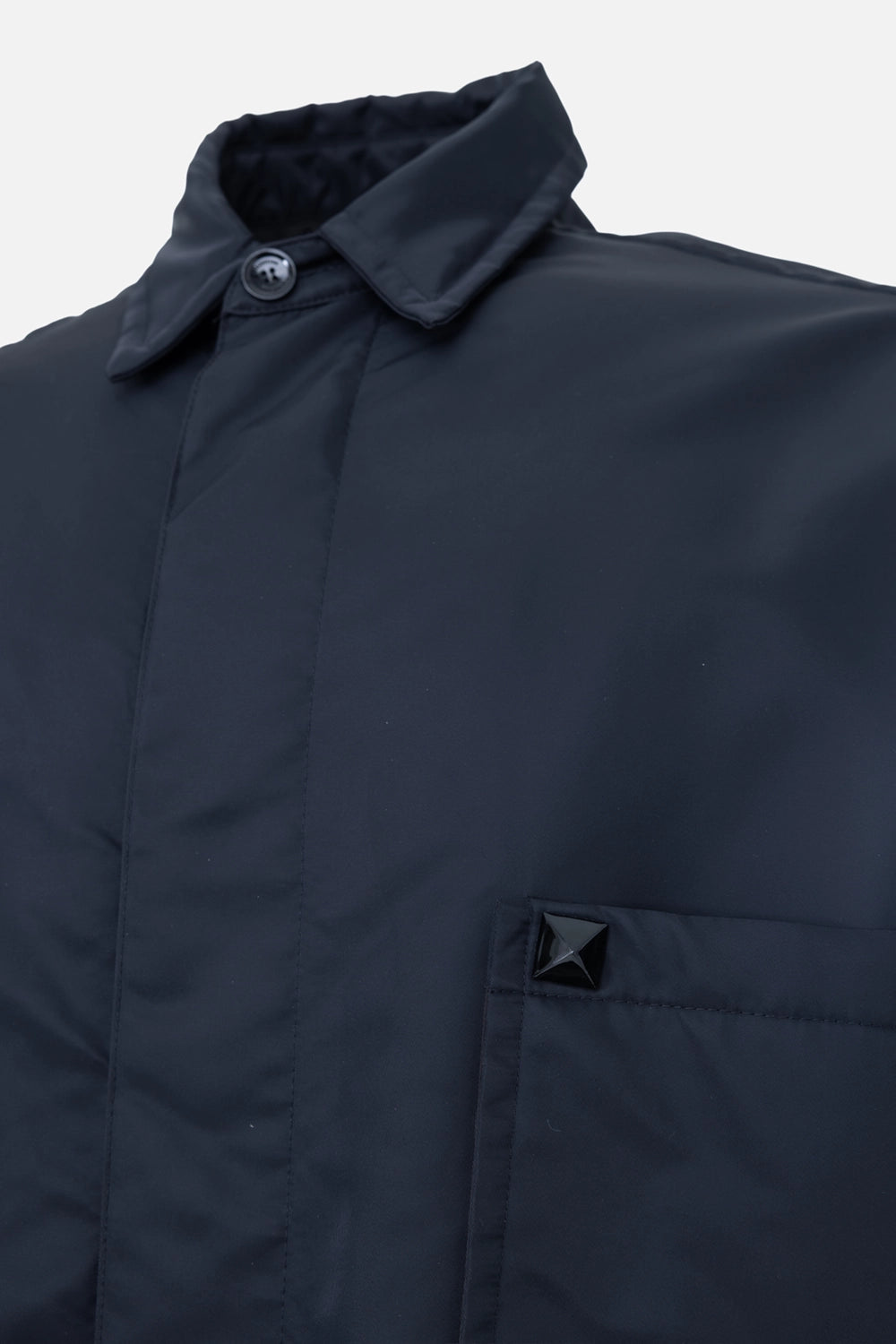 Pre-owned Valentino men's padded nylon overshirt in black, close-up, Roman Stud detail on chest pocket and point collar