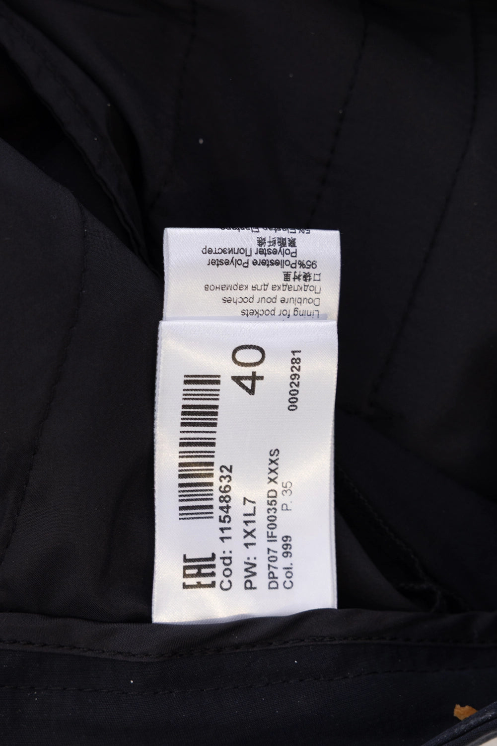 Pre-owned Dondup pants in black, care label close-up, style code and size 40 tag