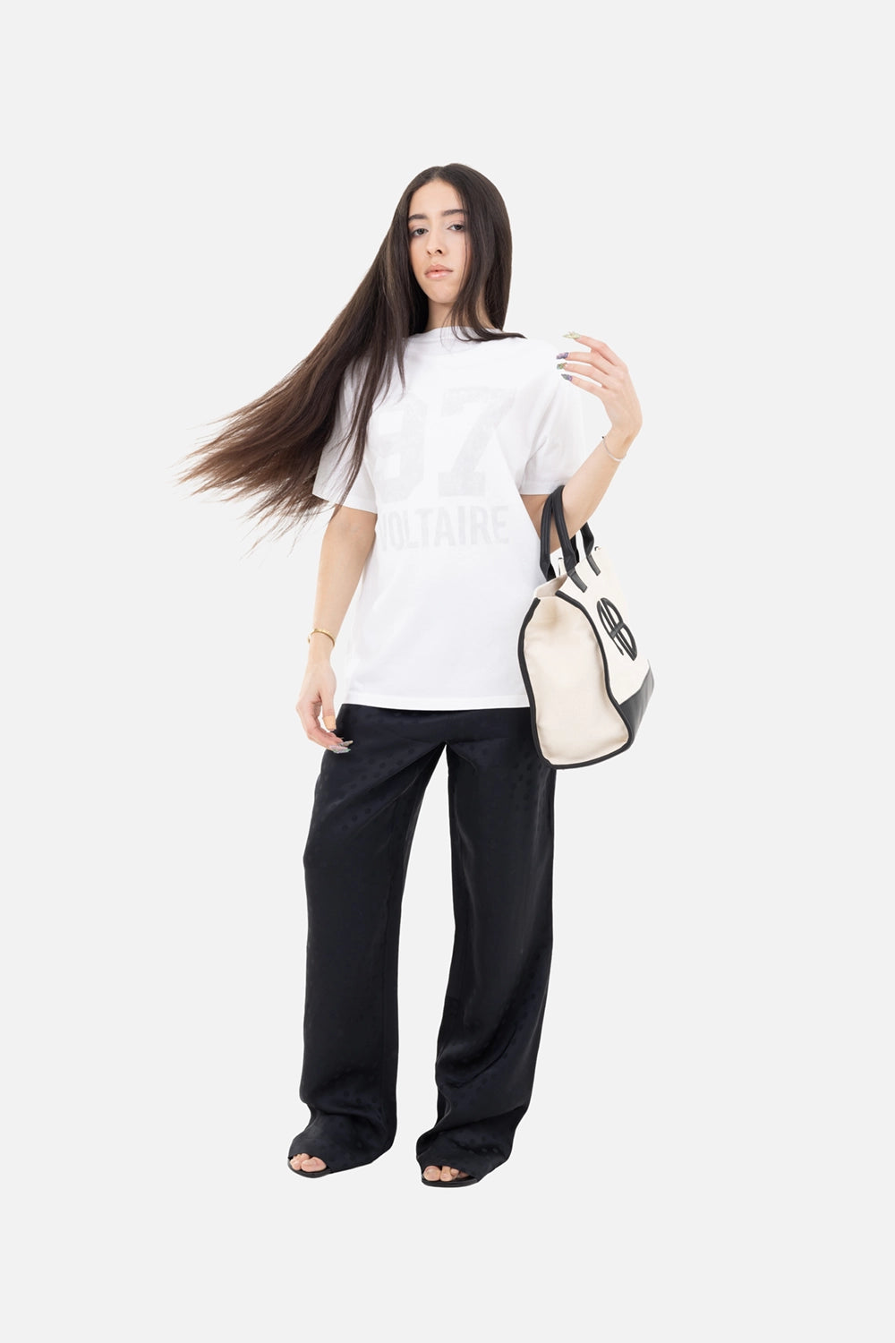 ANINE BING women’s pants in black dot jacquard, on-model full-length view, relaxed wide-leg fit and pooled hem.