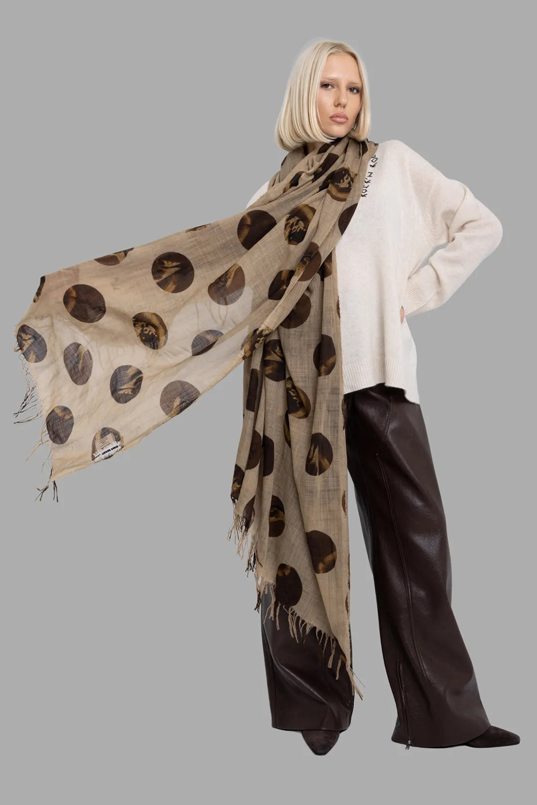 MSGM women's dark brown faux leather wide-leg pants, on-model full length, styled with oversized scarf and knit.