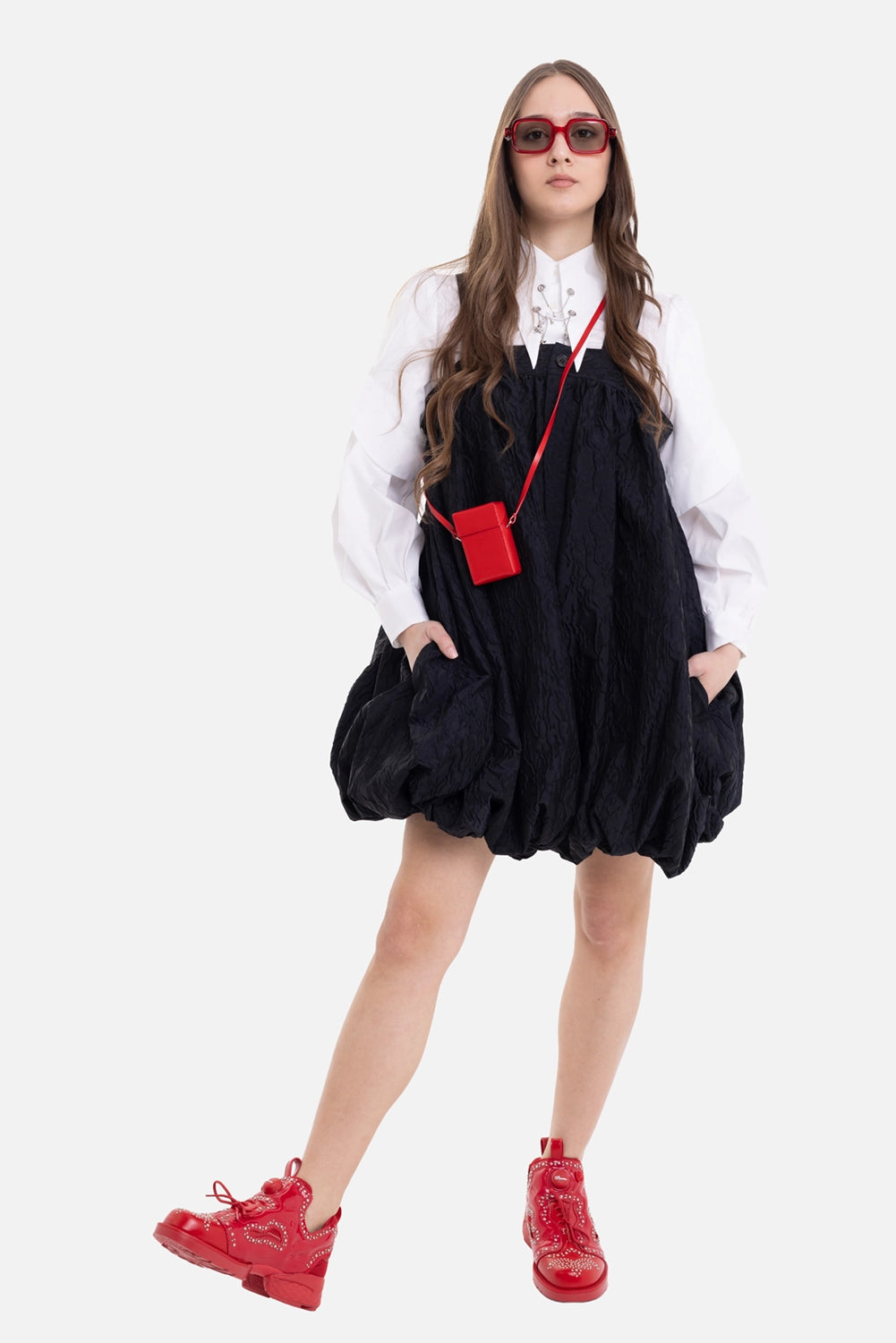noir kei ninomiya women's pinafore trousers in black, on-model full length, layered over white shirt