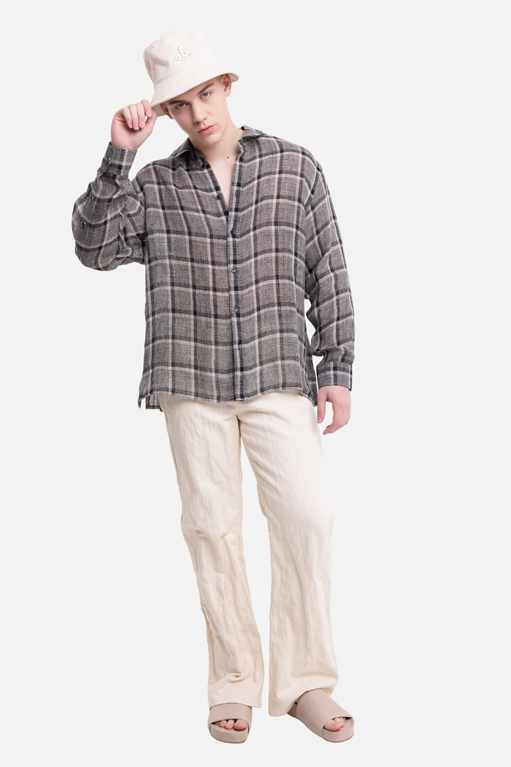 Helmut Lang men's plaid linen shirt in black/cream, on-model full-length view with open collar and rolled cuffs