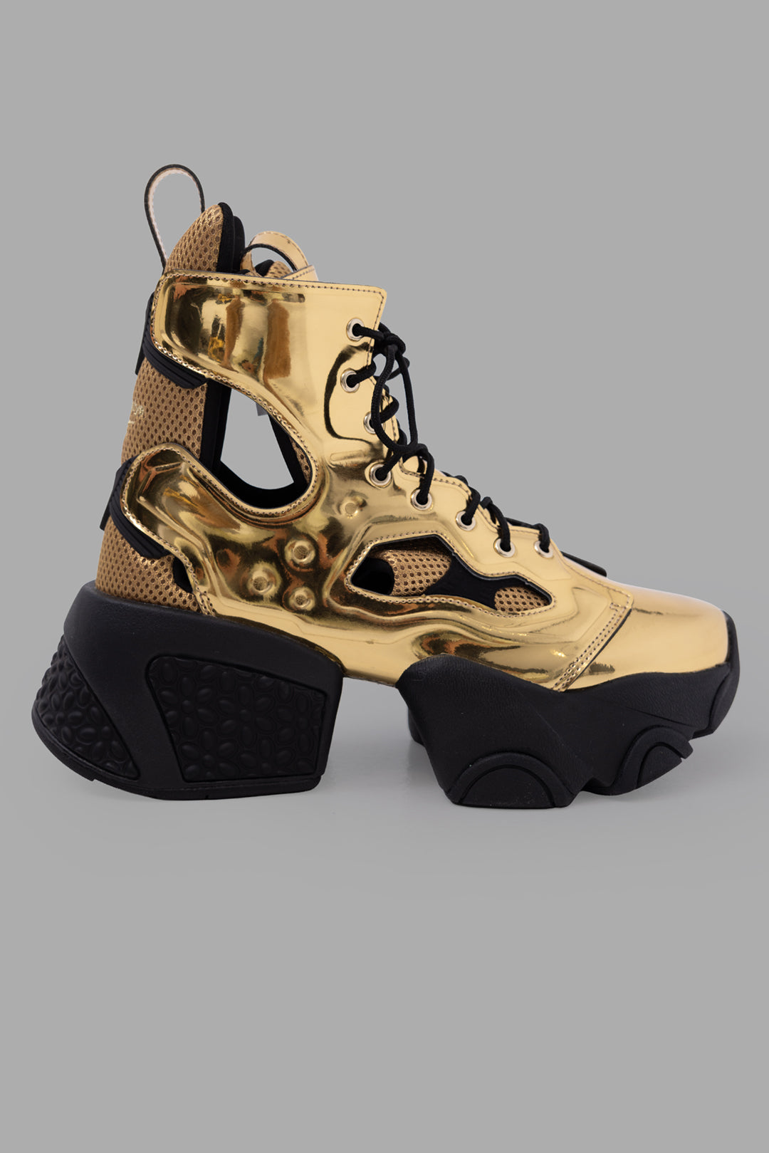 Noir Kei Ninomiya x Reebok unisex gold cutout platform boots, side view with mesh panels and chunky sole