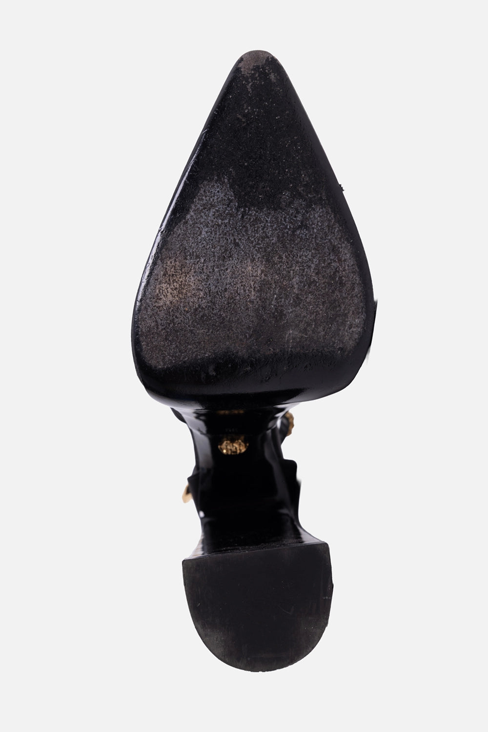 Pre-owned Versace women’s platform pumps in black, sole view, visible outsole wear and scuffing