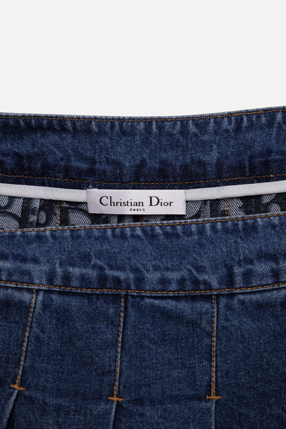 Christian Dior women's wrap skirt in blue, label detail with white tag and Oblique jacquard waistband