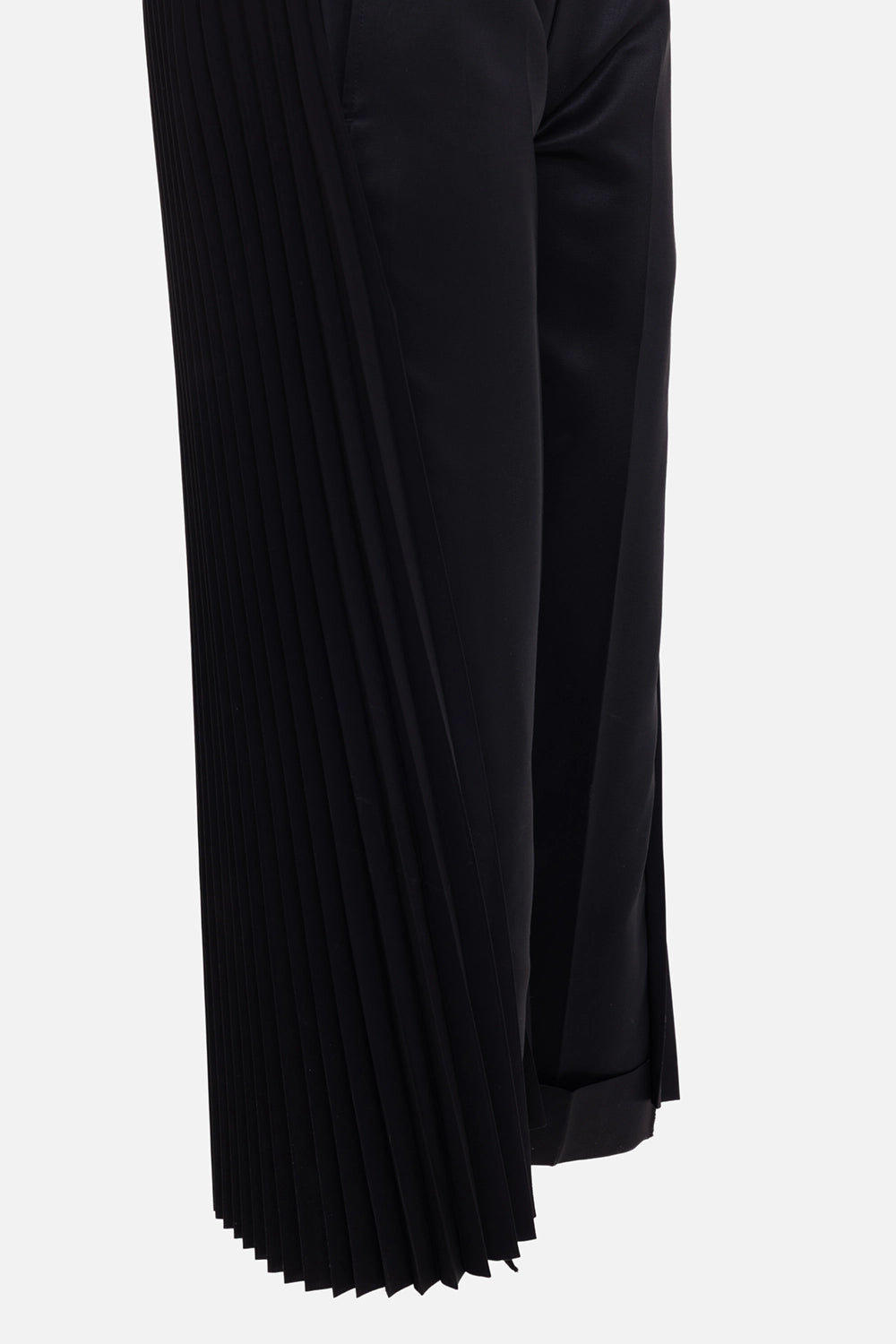 Junya Watanabe women's trousers in Black, back view with full pleated legs and elastic waist