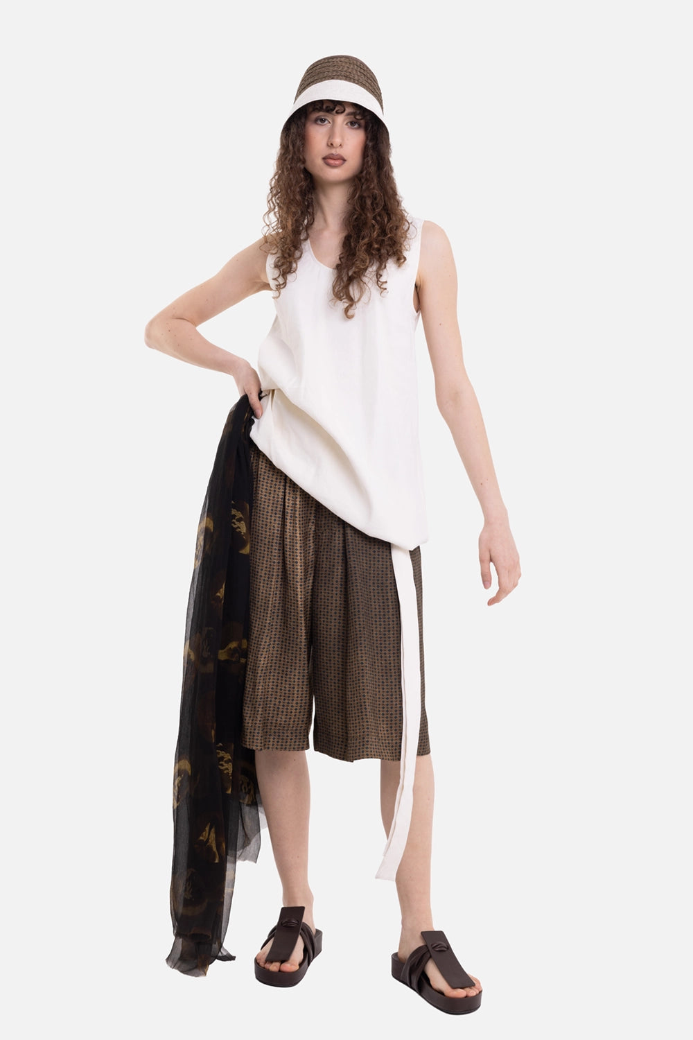 Uma Wang women's Poema pants in mustard brown, on-model full-length view, cropped wide legs and pleats