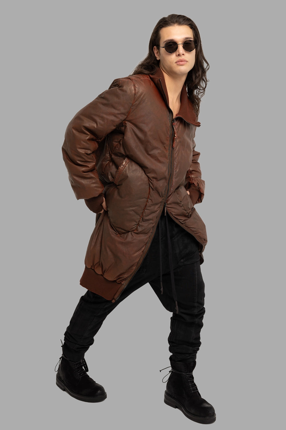 69 by Isaac Sellam men’s puffer coat in Dirty Red, on-model full length, ribbed high collar and curved quilting