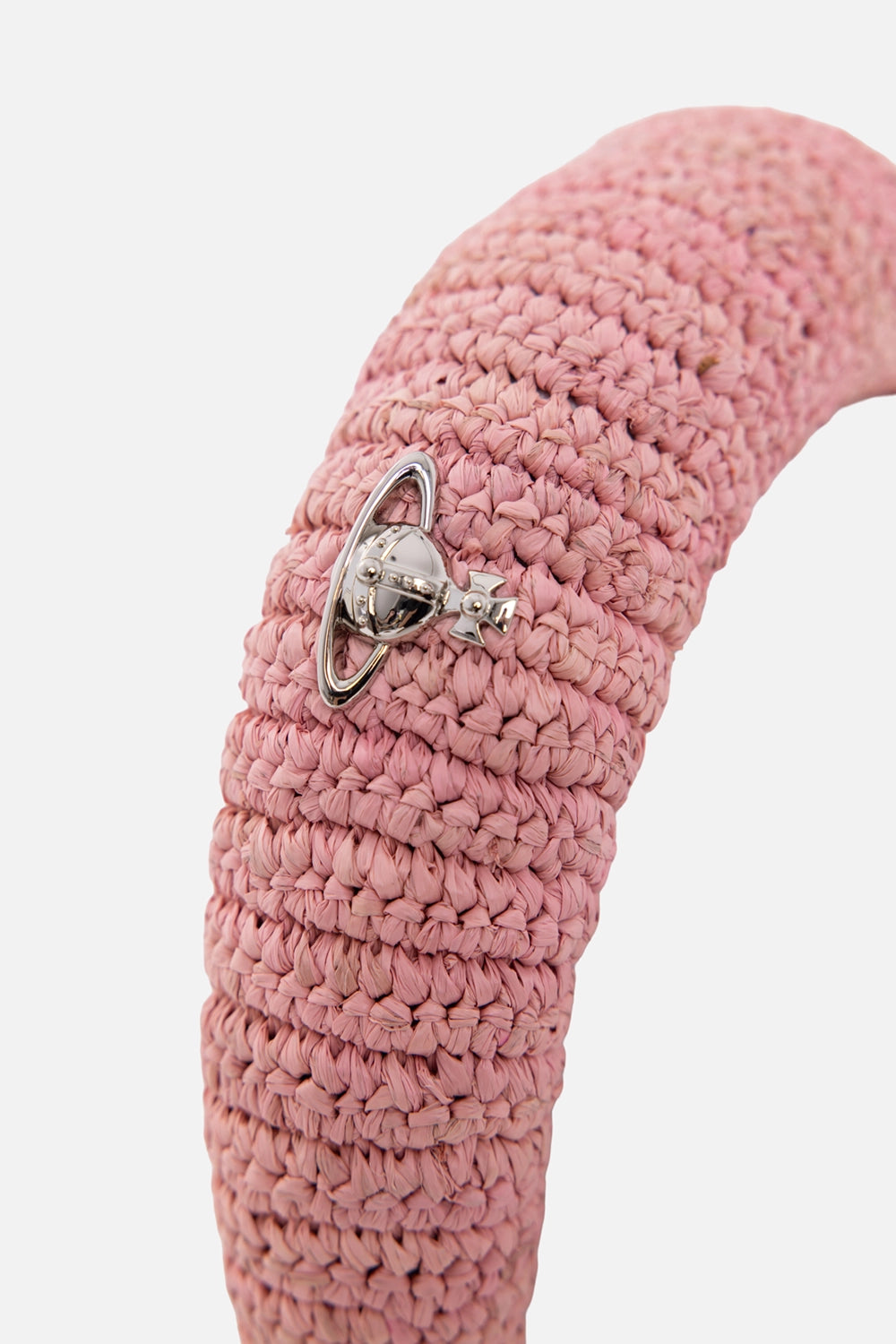 Vivienne Westwood women's headband in rose poudre, logo detail, silver Orb hardware on woven raffia