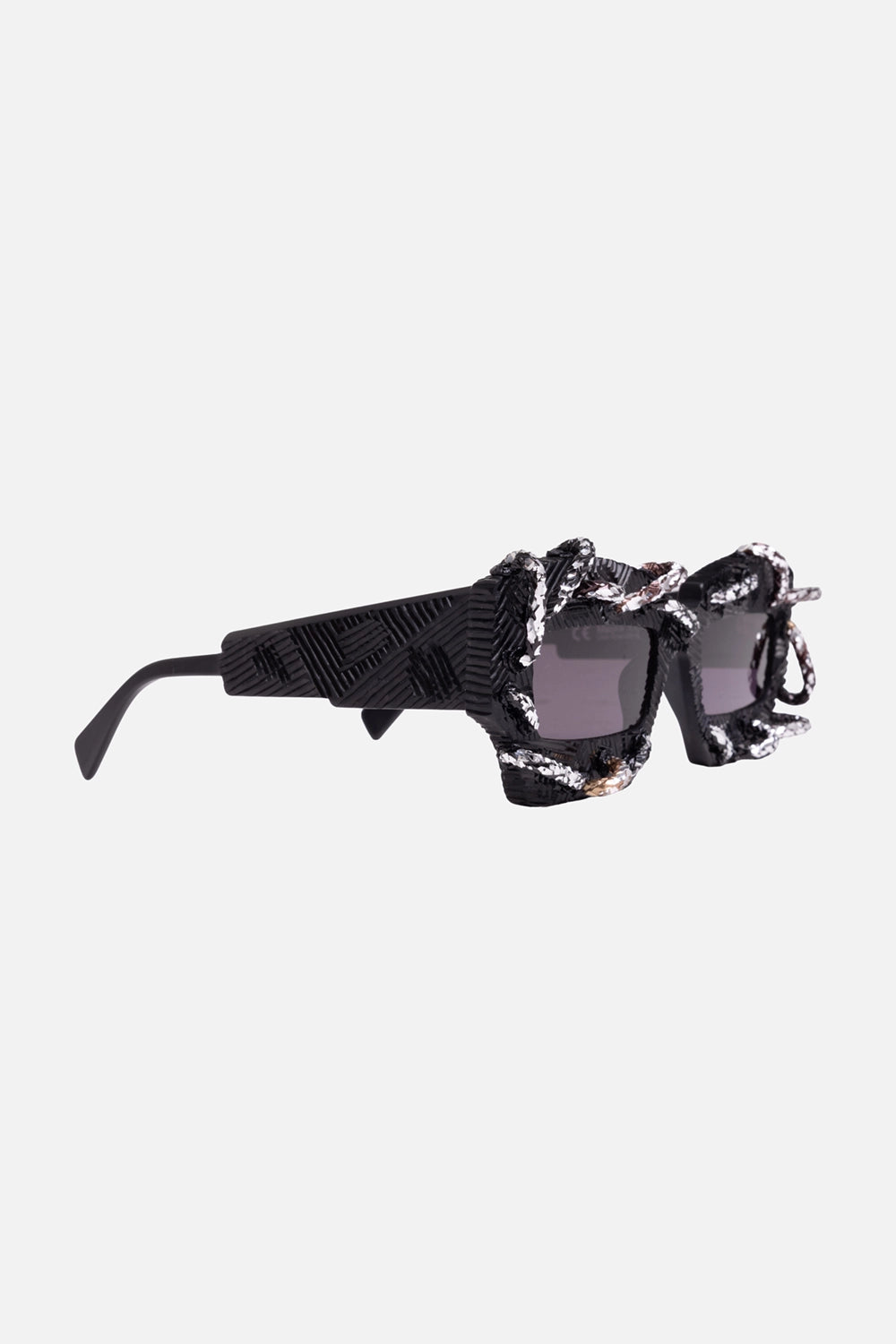 Kuboraum unisex rectangular sunglasses in black matt, 3/4 view, raised accents and wide temples