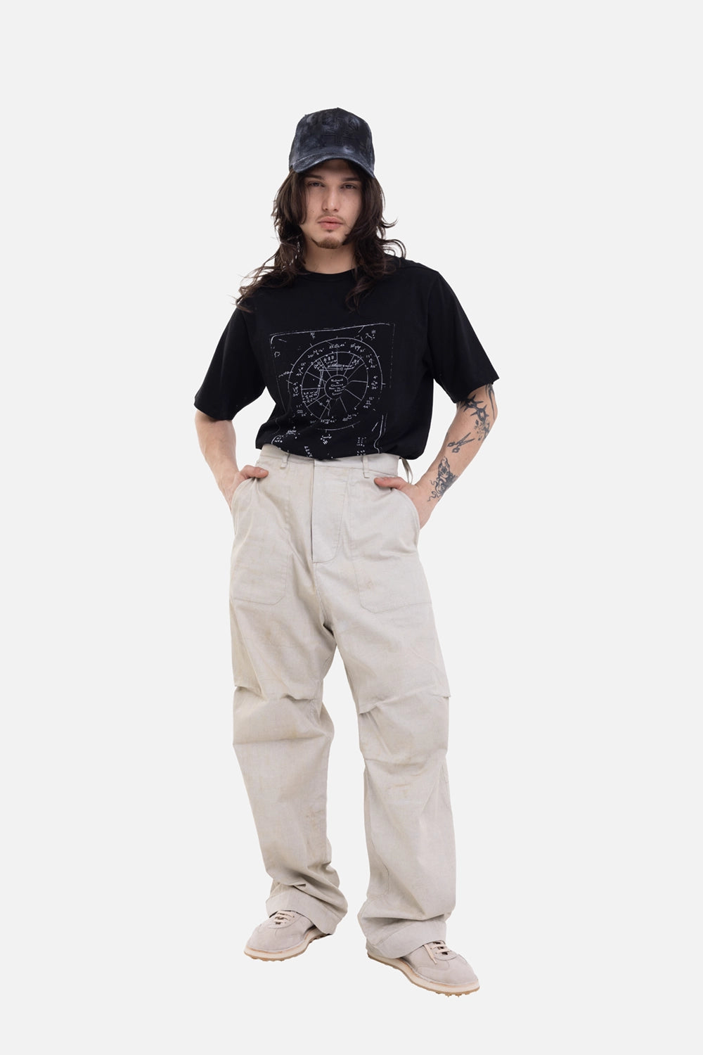 Masnada men's Reversible Over Pants in Ecru, on-model full-length with front patch pockets and loose leg