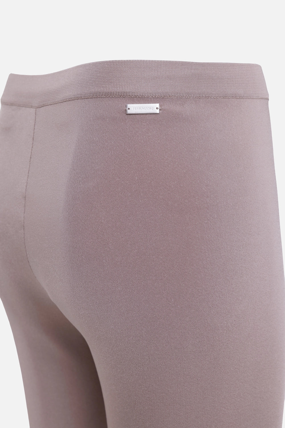 Ferragamo women's leggings in safari beige, logo detail with silver plaque and fine ribbed knit