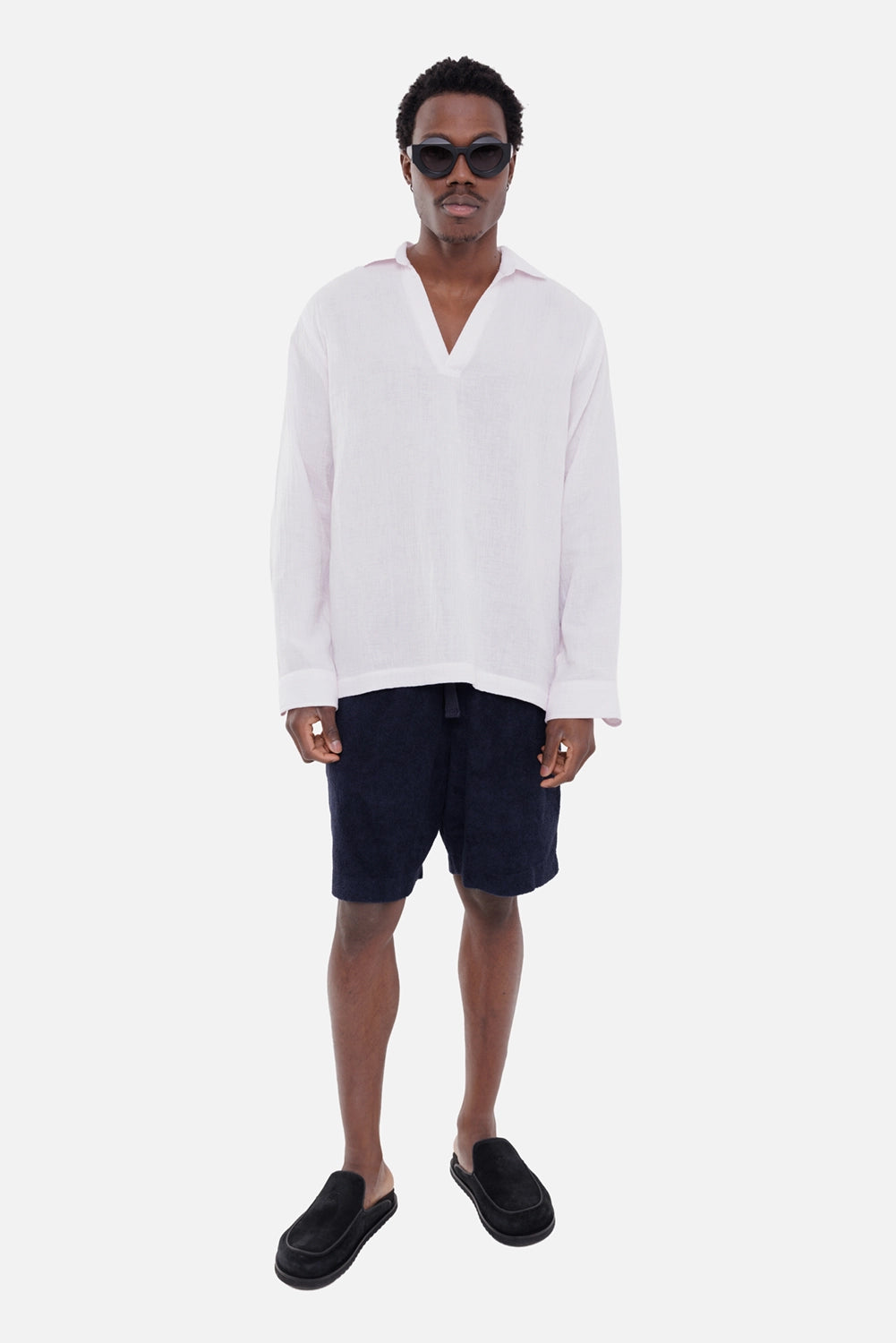 Orlebar Brown men's shirt in Macaron Pink, on-model full-length view with open V-neck placket