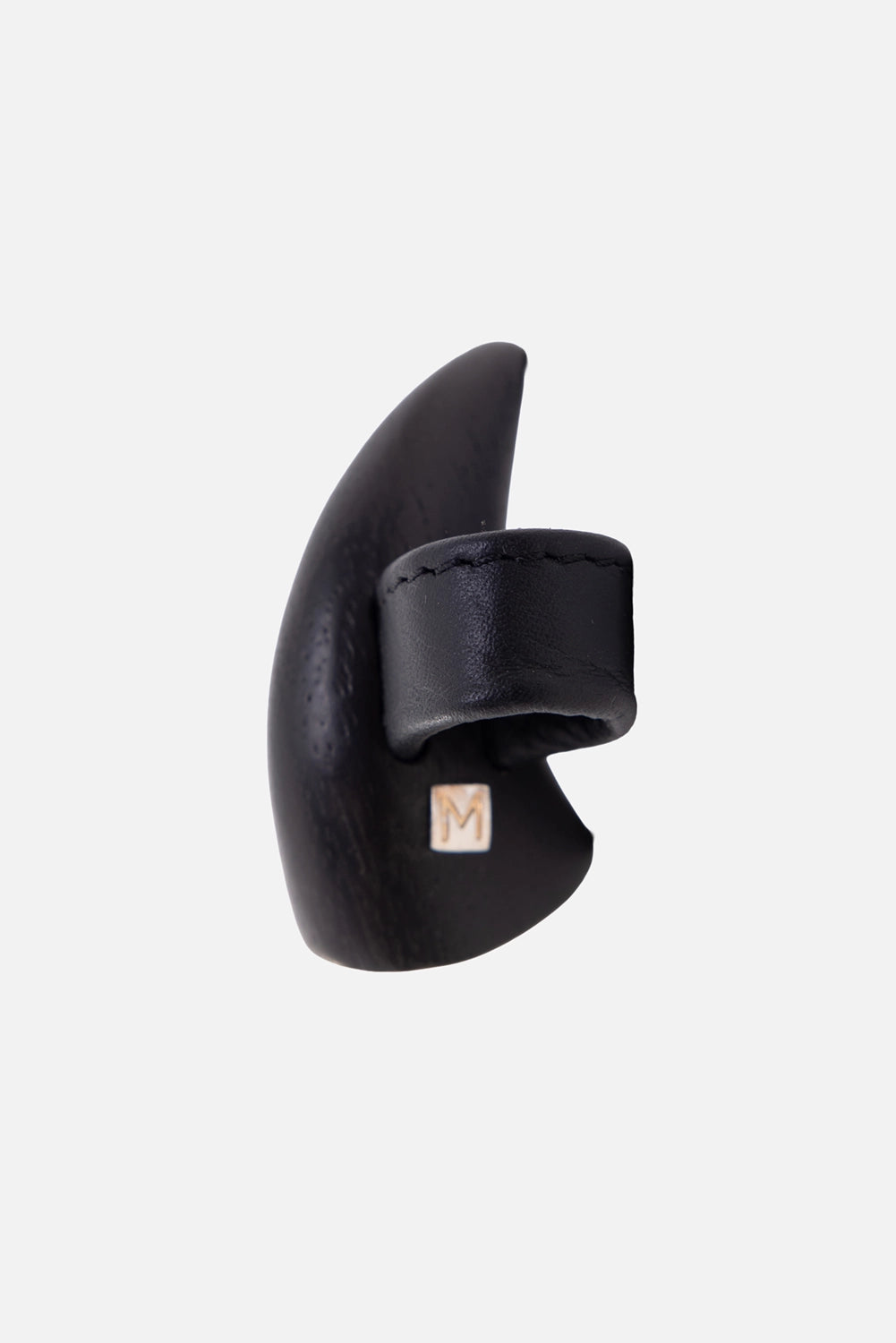 Monies women's ring in black, back view, leather band and small square logo plaque