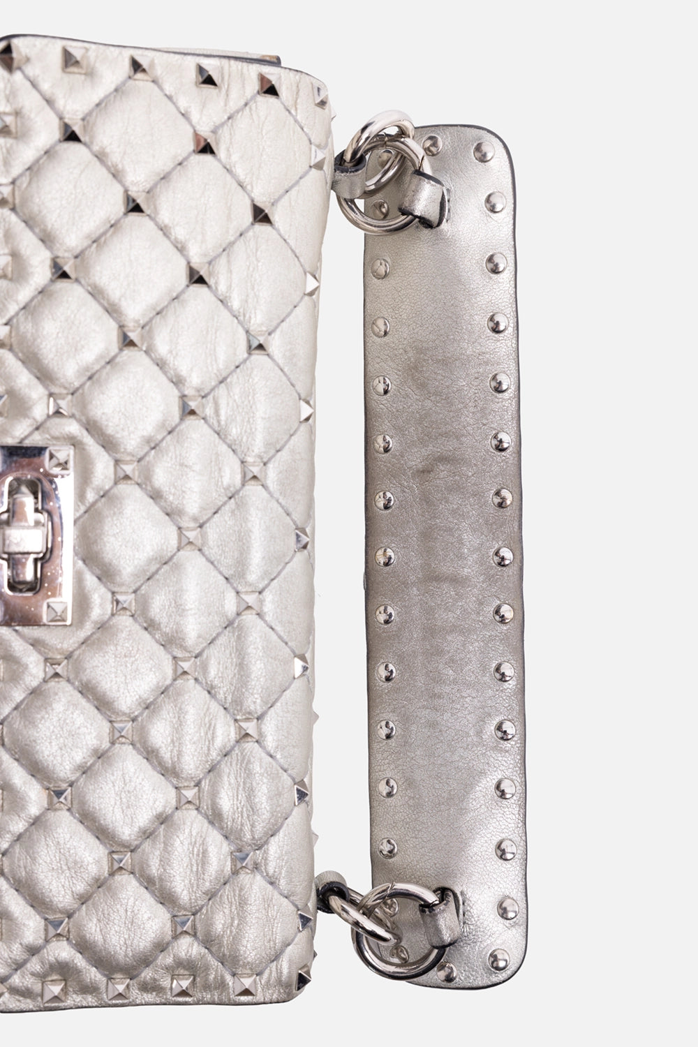 Pre-owned Valentino Garavani small shoulder bag in silver, handle close-up, studded strap with ring hardware