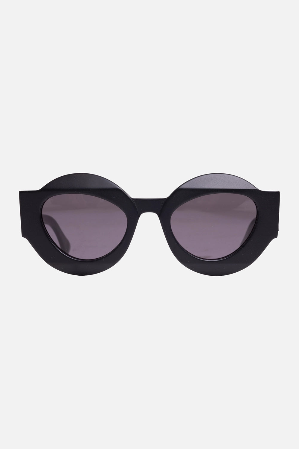 Kuboraum unisex round sunglasses in black matt, front view, thick sculptural rims and grey lenses