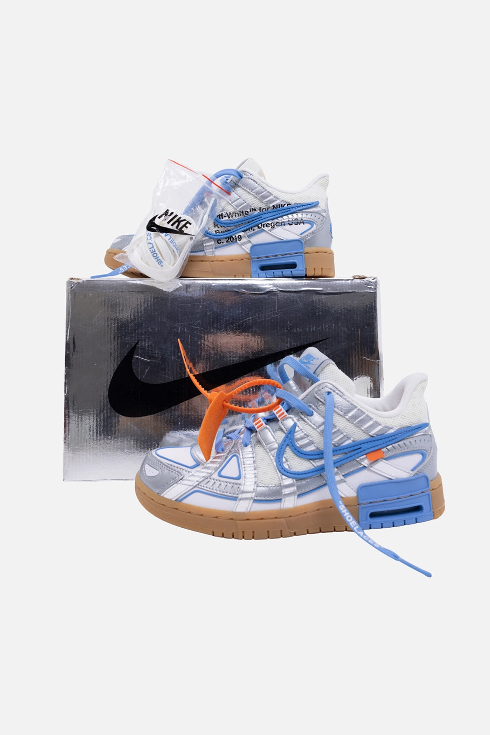 Pre-owned Nike x Off-White unisex Rubber Dunk sneakers in white/blue, with box view, metallic Nike box and lace bag
