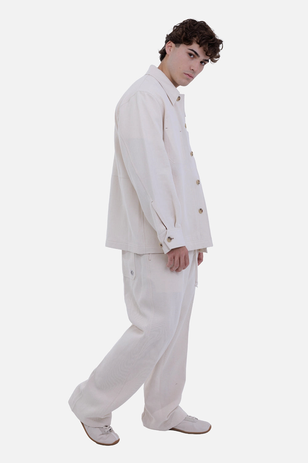 Helmut Lang men's Sailor Overshirt in muslin, on-model view with relaxed fit and button cuffs
