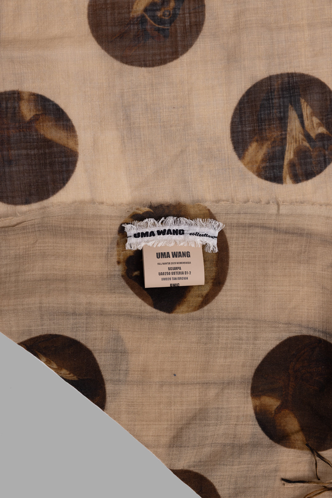 Uma Wang unisex tan brown wool scarf, rolled view highlighting lightweight texture and all-over dot pattern.