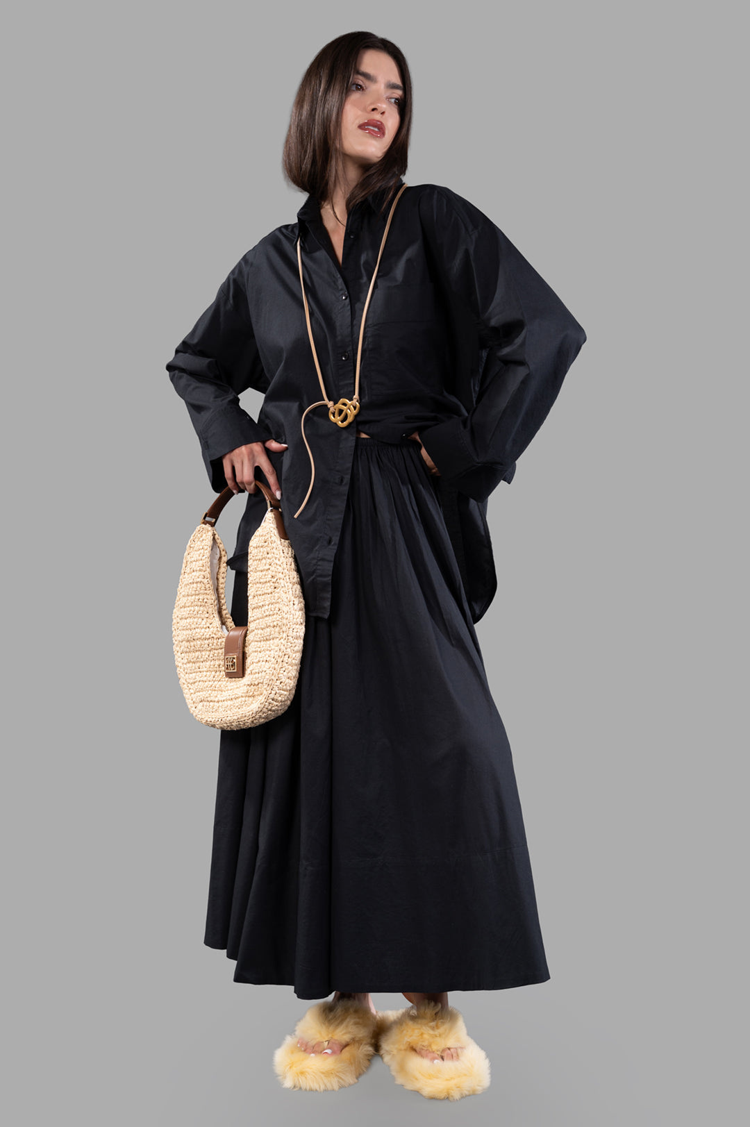 By Malene Birger Derris Organic Cotton Shirt in black, on-model front view, styled with accessories and skirt.