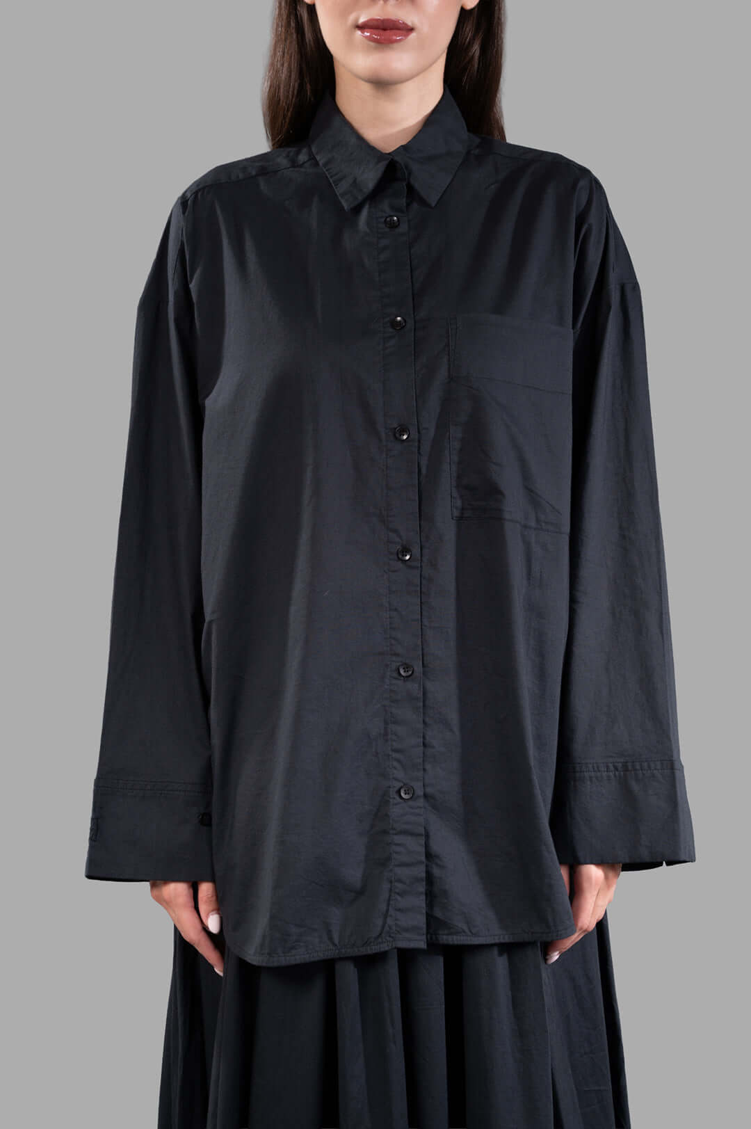 By Malene Birger. Derris Organic Cotton Shirt in black, front view showcasing buttons and smart collar detail.
