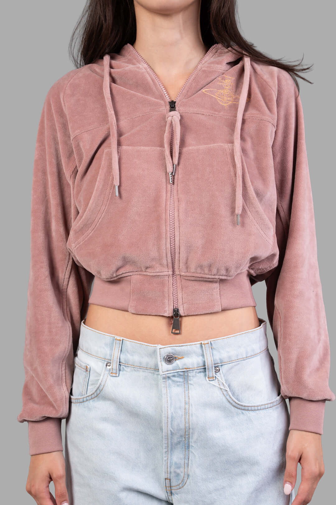 Vivienne Westwood Velvet Zip-up Hoodie styled on a model, featuring a cropped fit, front pockets, and an embroidered logo.