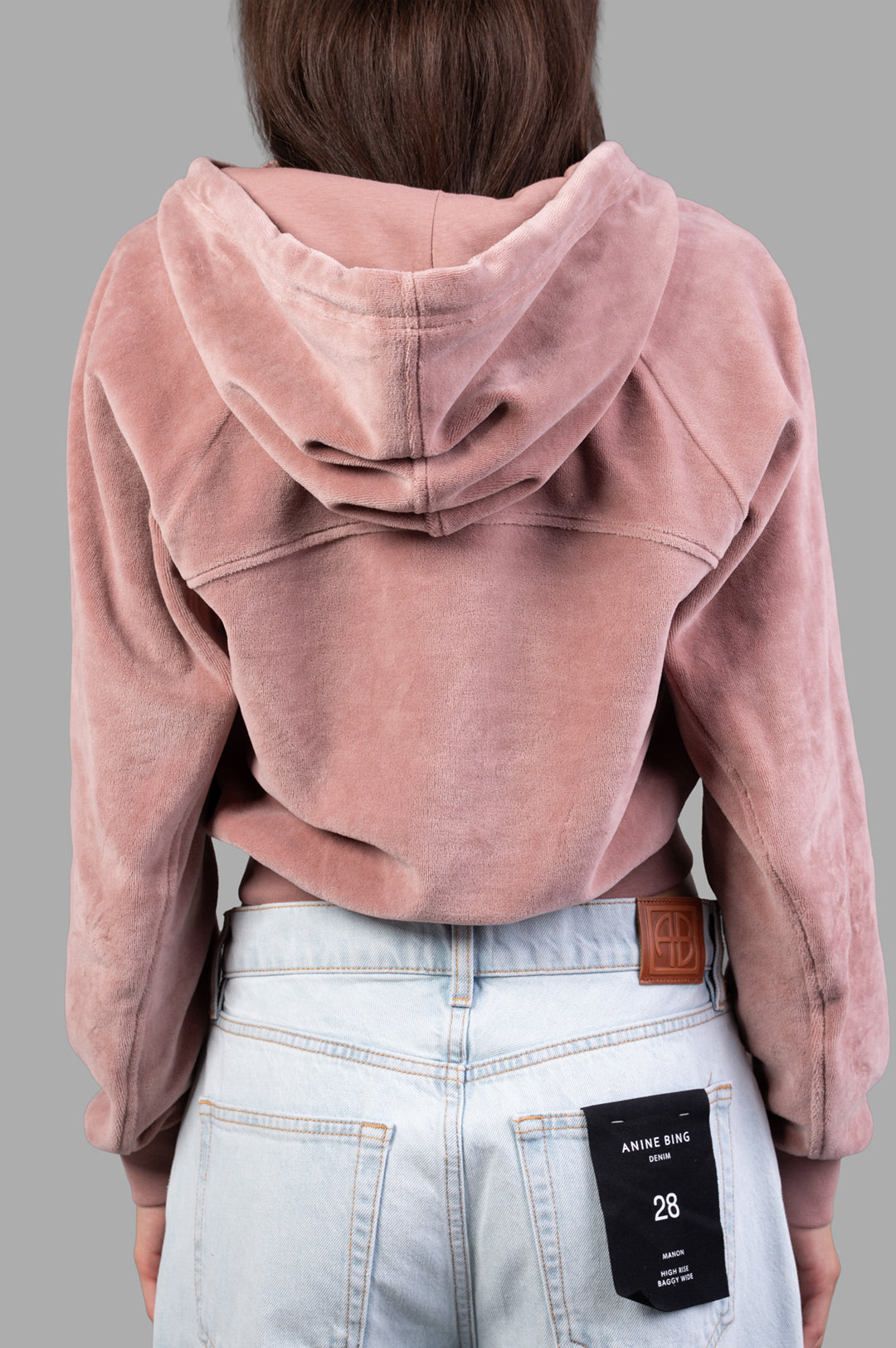 Vivienne Westwood Velvet Zip-up Hoodie shown from the back, featuring soft velvet fabric and an adjustable hood.